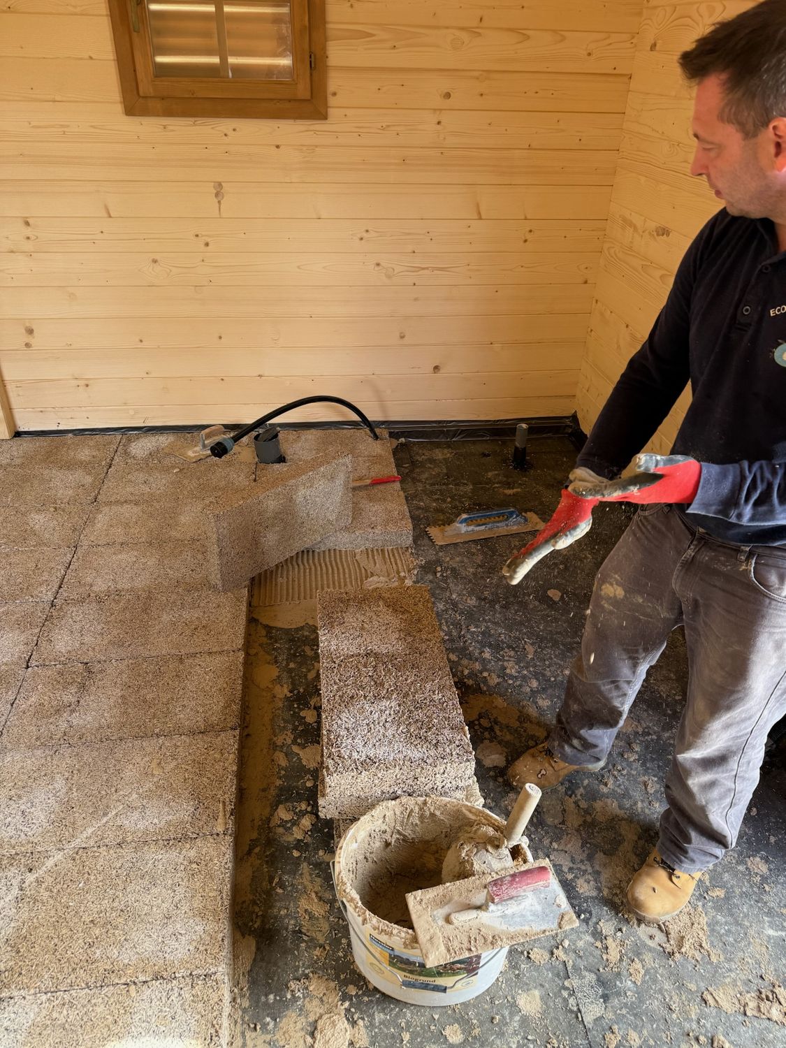 Hempcrete being laid by hand