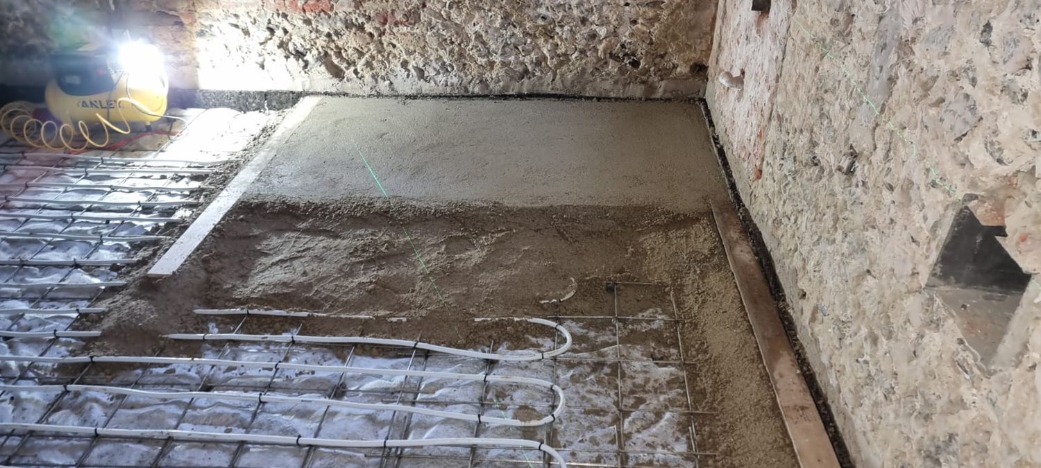 Limecrete floor installation, checking levels