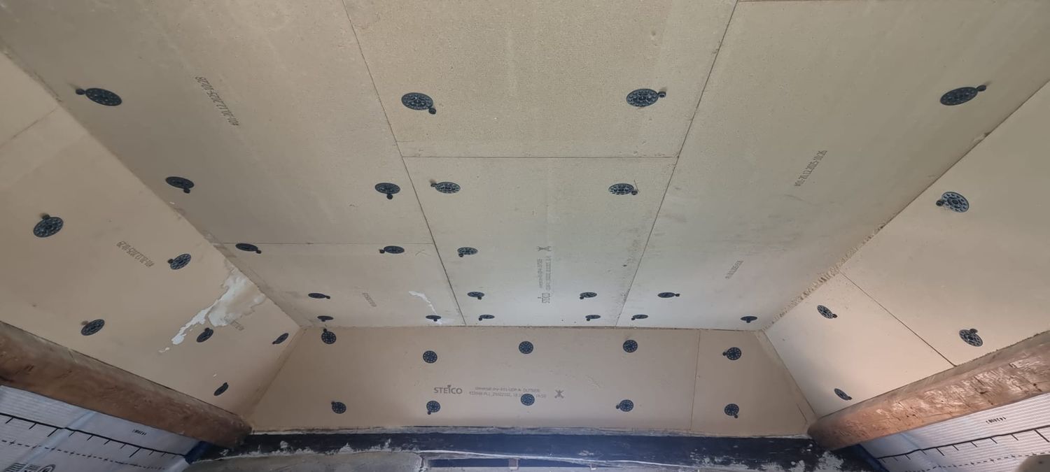 Steico Duo Dry rigid wood fibre insulation boards fixed under the rafters