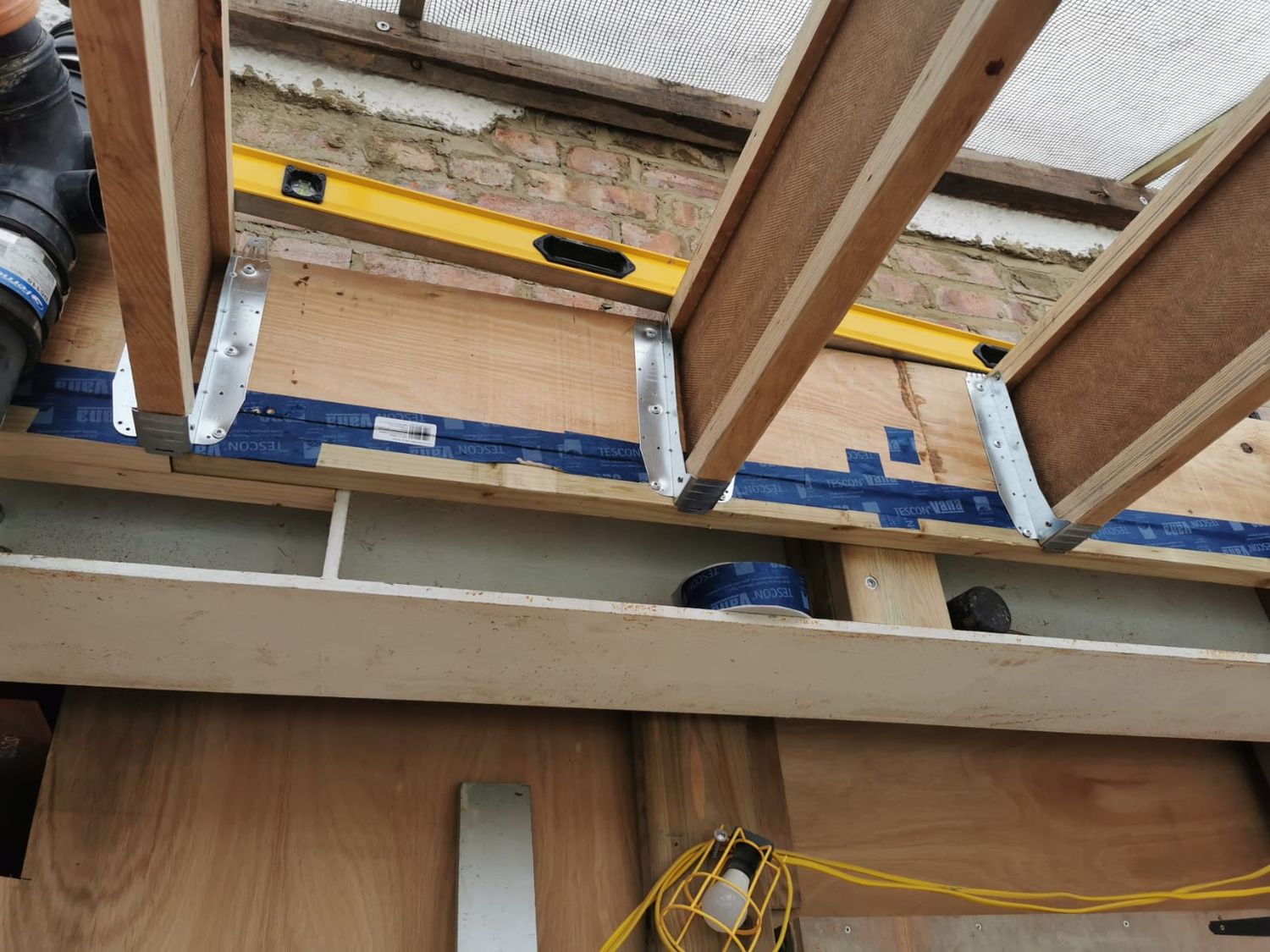 Installation of wall structure with I-joists