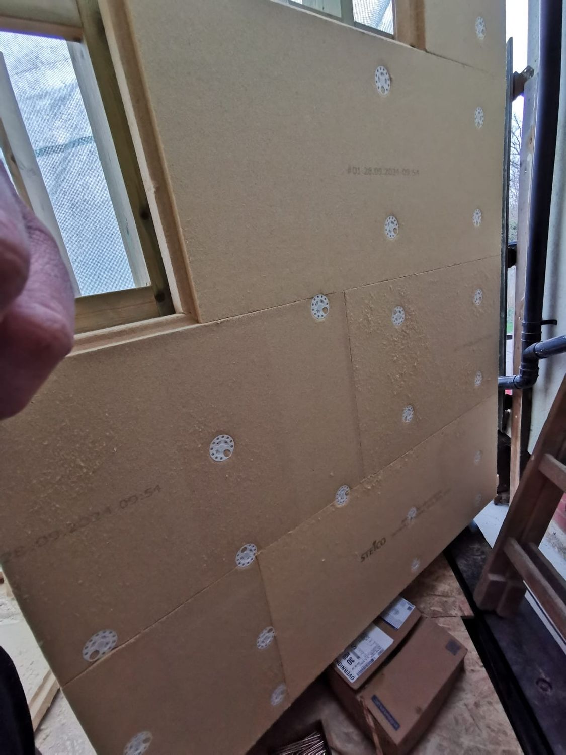 Installation of Steico wood fibre external insulation boards for timber frame extension