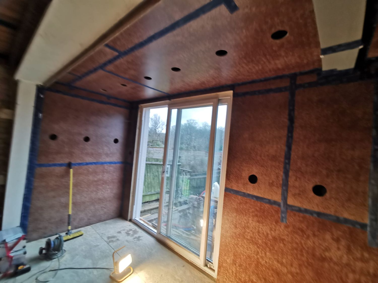 Preparation for blowing cellulose Warmcel insulation to timber frame
