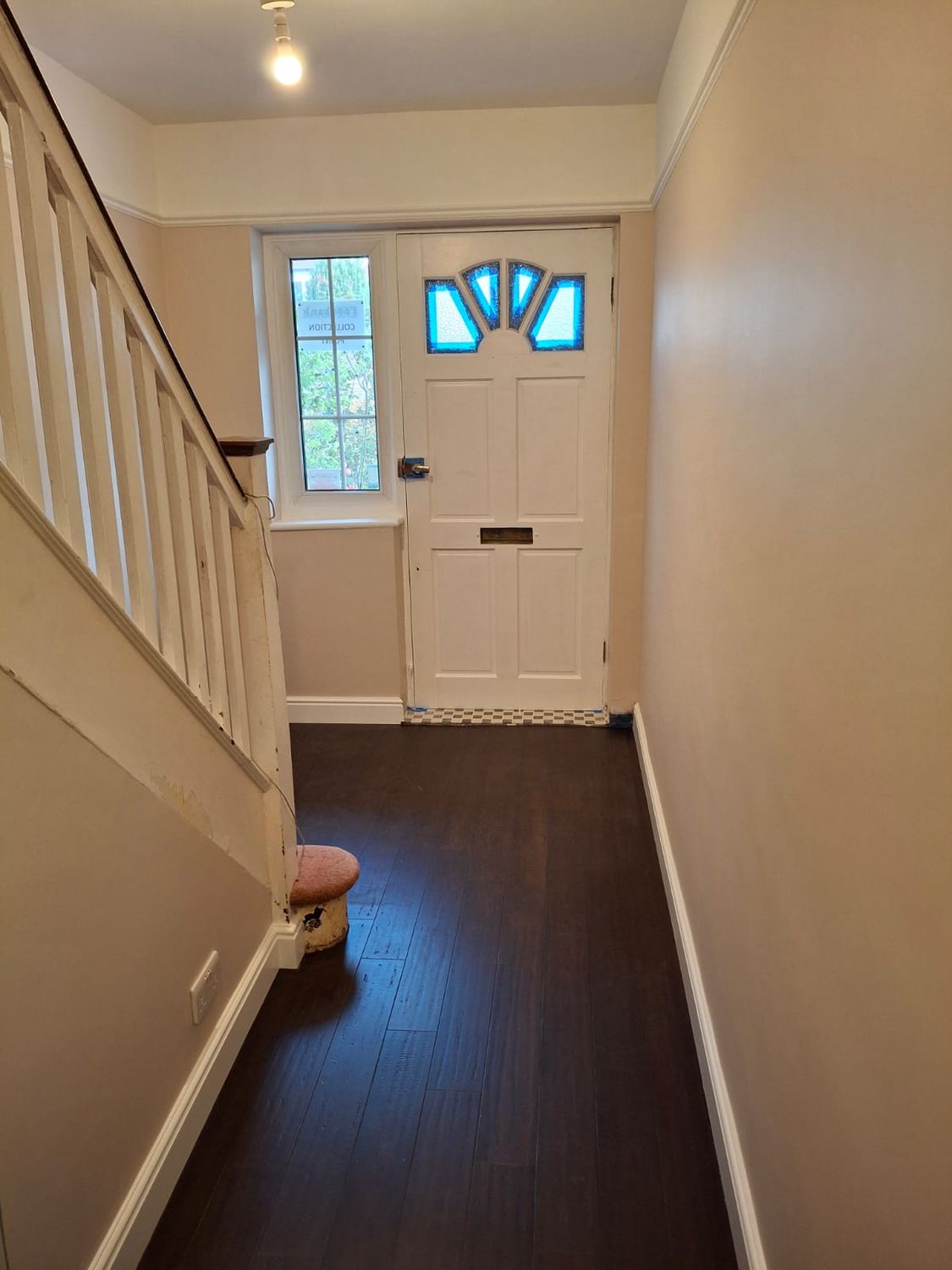 Hallway decorated bamboo floor installed over underfloor heating