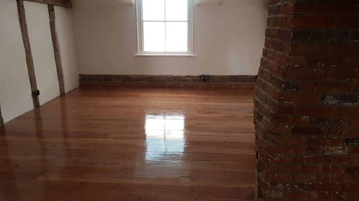 Stained and varnished floorboards