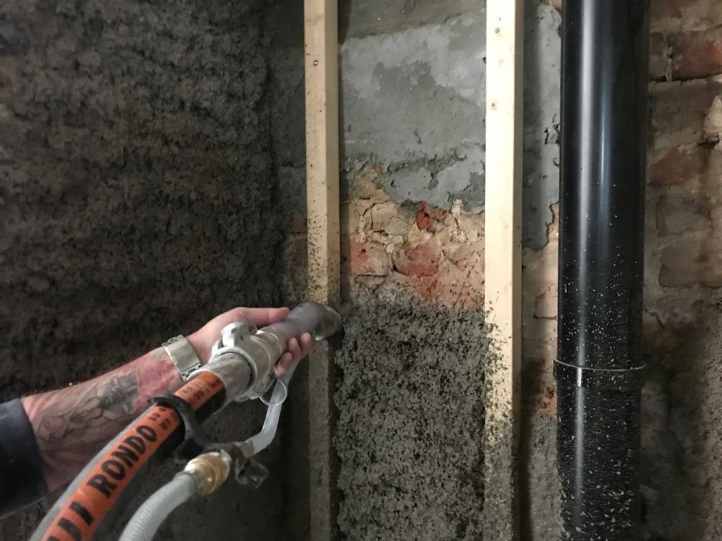 Diathonite Evolution plaster being sprayed - IWI
