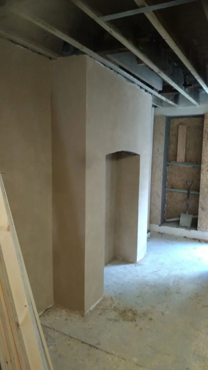 Lime plaster over Diathonite insulated plaster