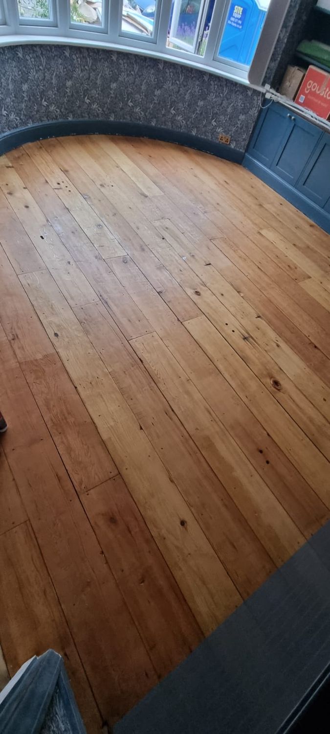 Completed floor insulation with finished floorboards