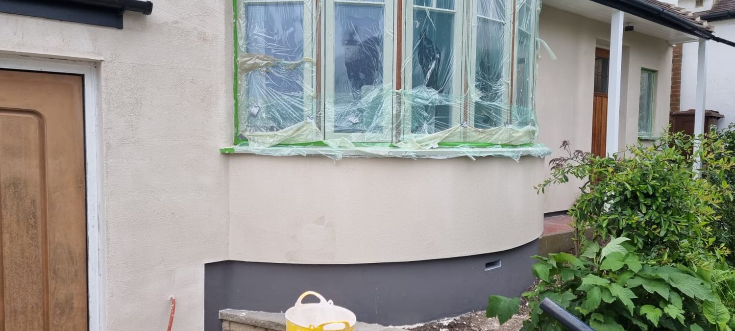 Installation of plinth insulation boards - under bay windows