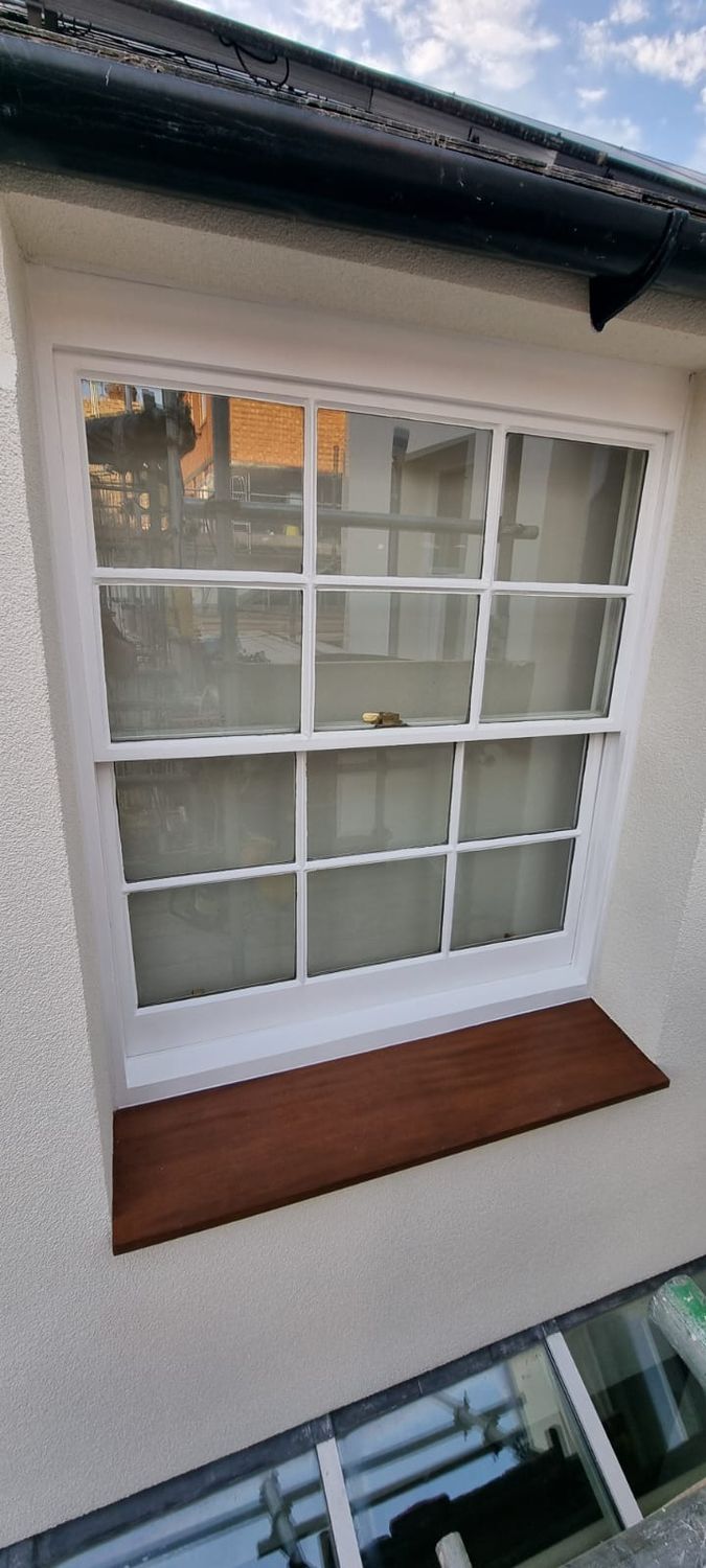 Window frames and sills painted
