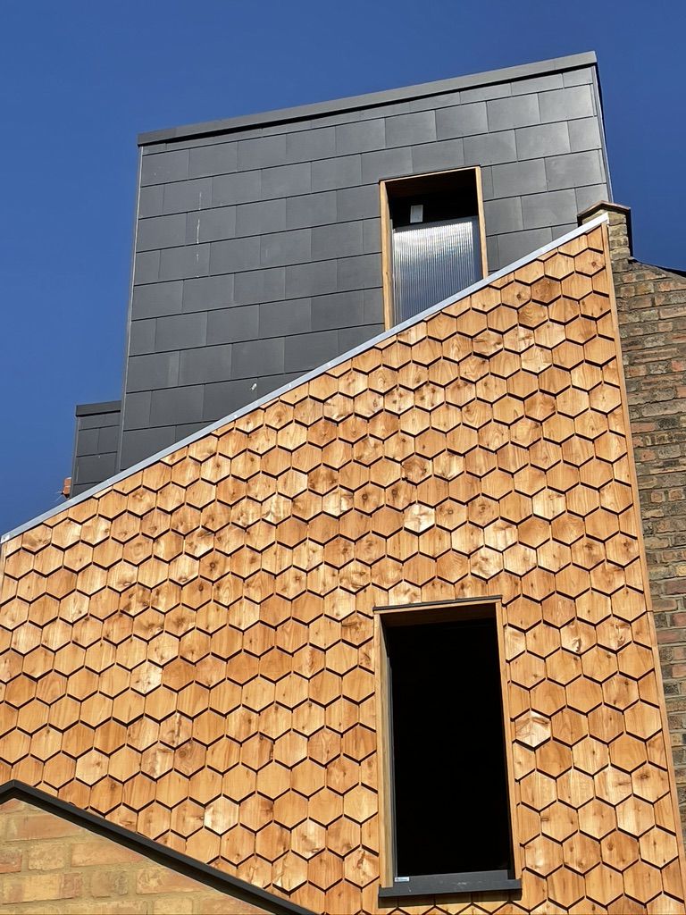Completed cedar wood shingle cladding