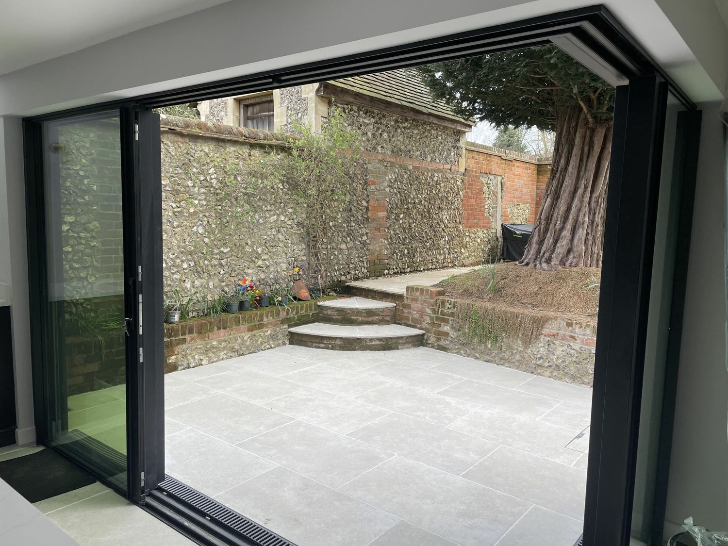 New patio completed with steps in Penn listed building