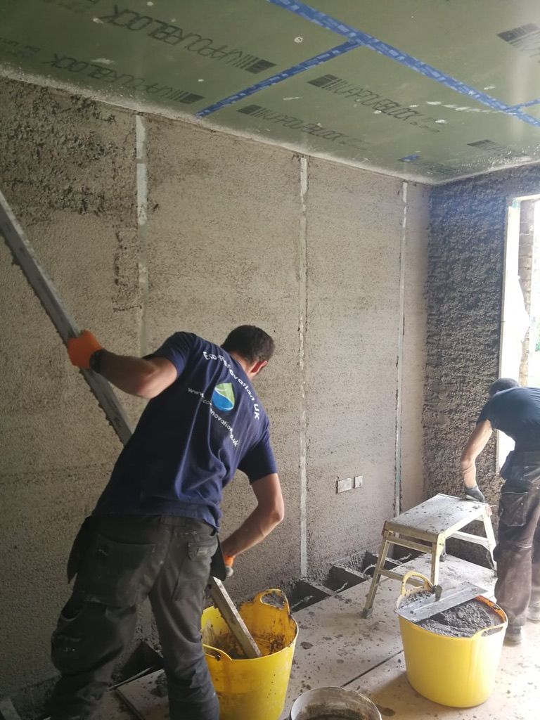 Diathonite Evolution lime-cork-clay insulation plaster being levelled off