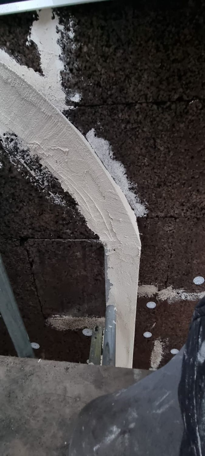 Cork boards being cut around intricate details