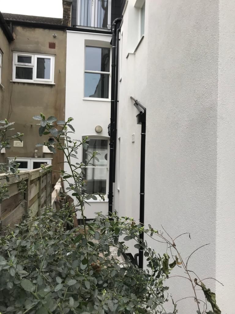 External wall insulation with cork insulation boards installed, with breathable silicone render in London