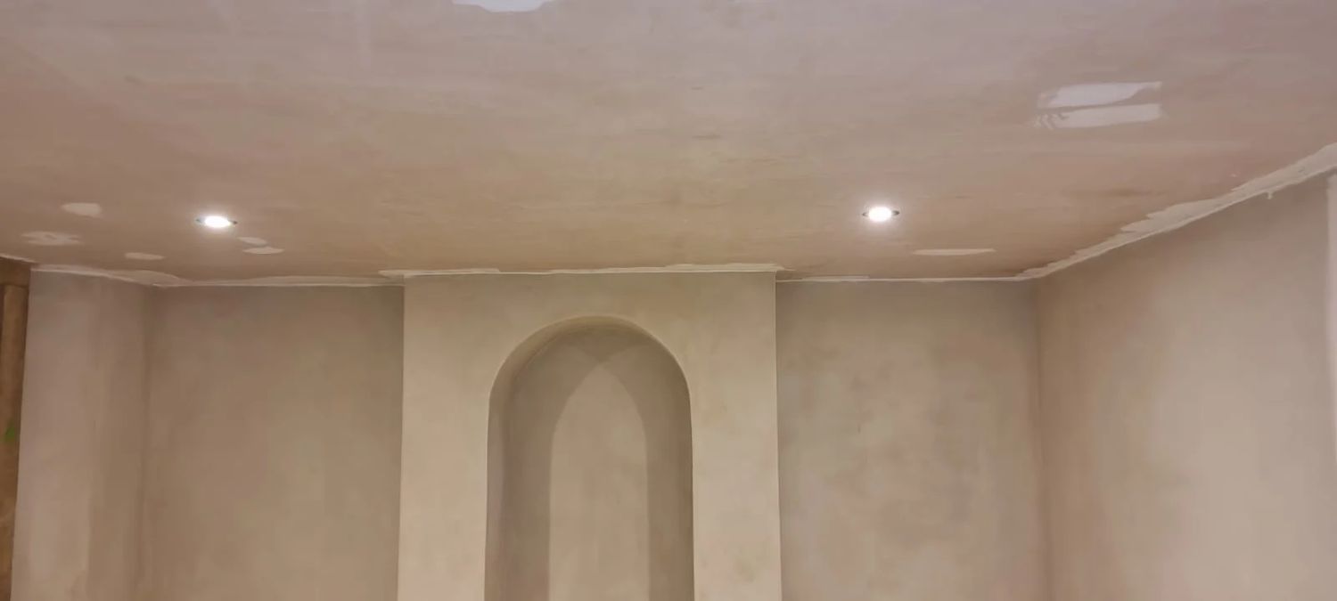 Application of Argatherm lime smoothing coat to walls
