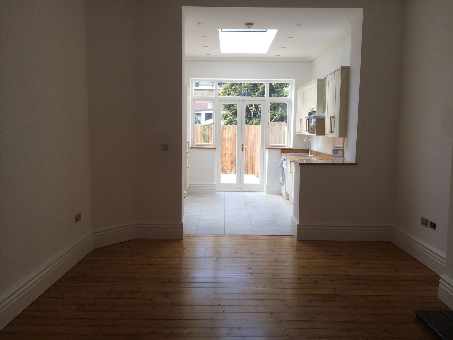 New extension with kitchen at the rear in Edwardian house in Belsize park