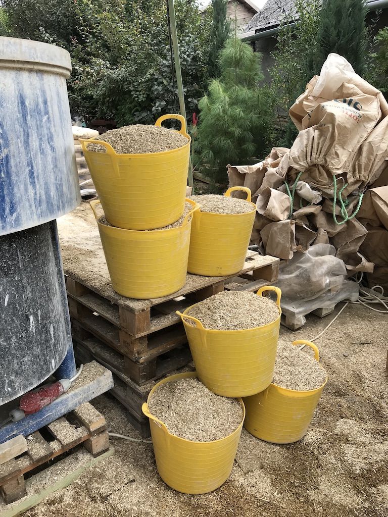 Buckets of hemp ready for on-site mixing