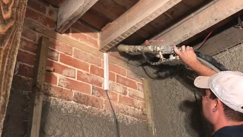 Spraying diathonite to walls at the floor structure level