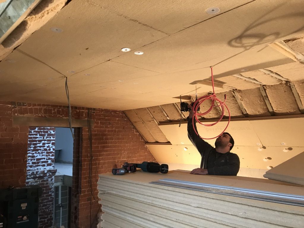 Fixing Pavatex wood fibre insulation boards onto ceiling