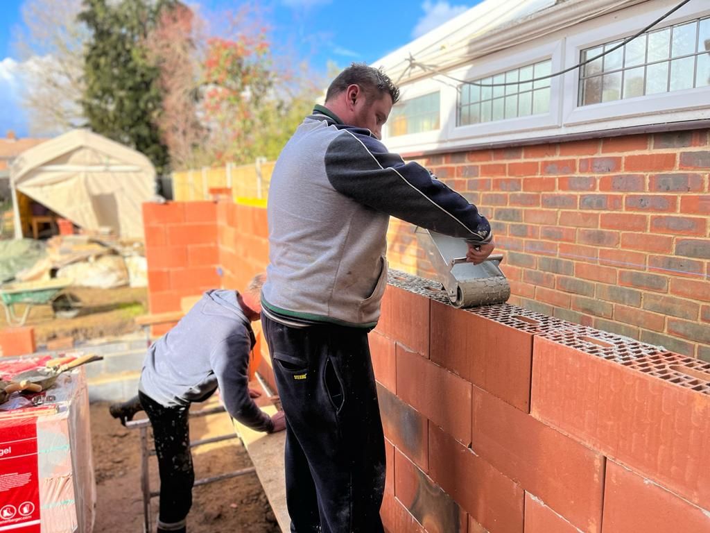 Wienerberger Porotherm Ceramic blocks being laid with easy mortar-roller