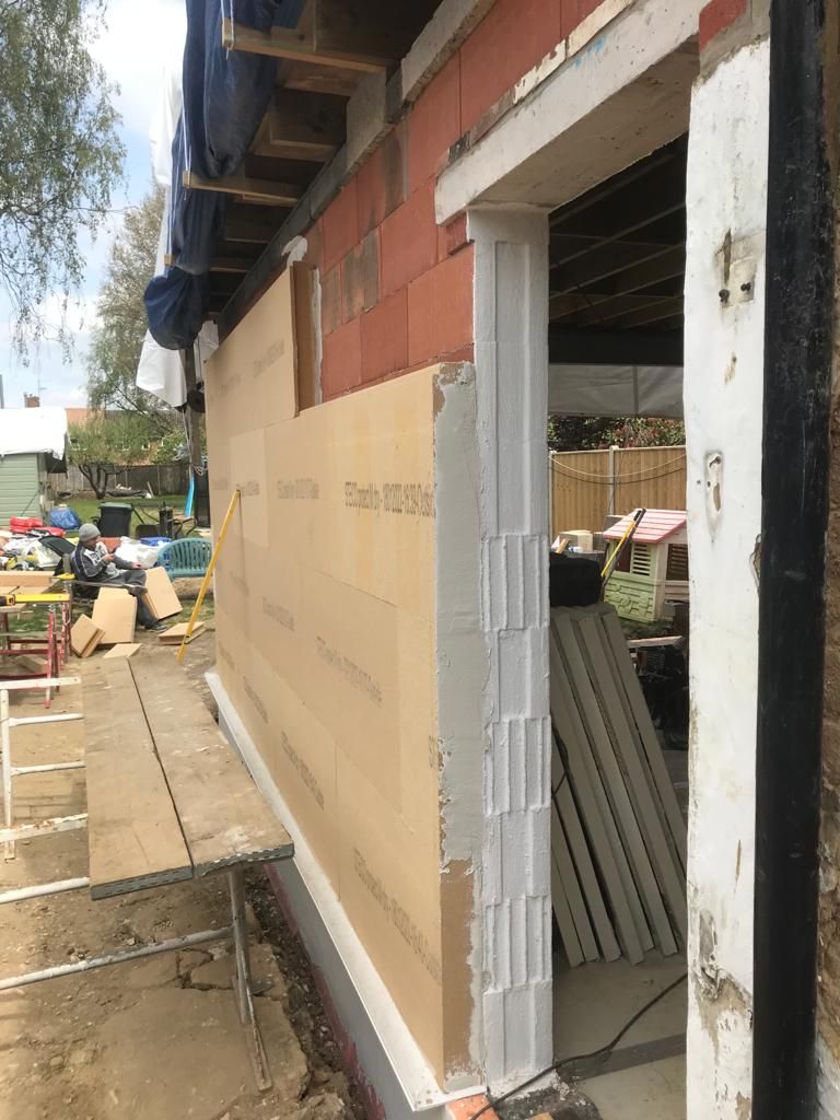 200mm Steico wood fibre insulation boards being installed onto ceramic blocks
