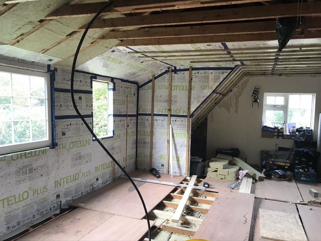 Installation of Pro Clima airtight system, Intello Plus vapour control membrane taped with Tescon Vana tapes
