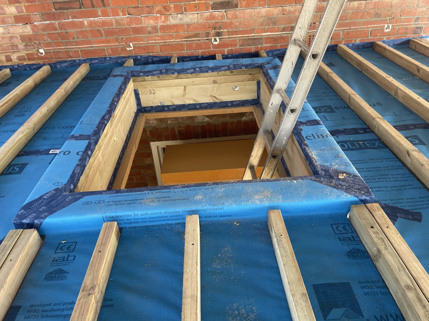 Installation of counterbattens onto Solitex Plus roofing membrane to create ventilation for roof under green roof