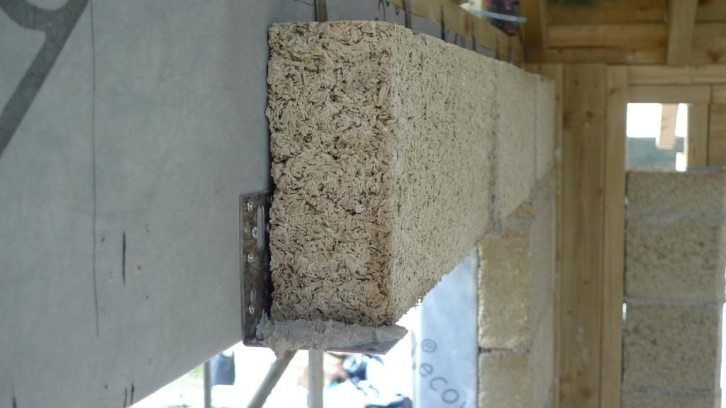 New extension wall being built with hempcrete blocks