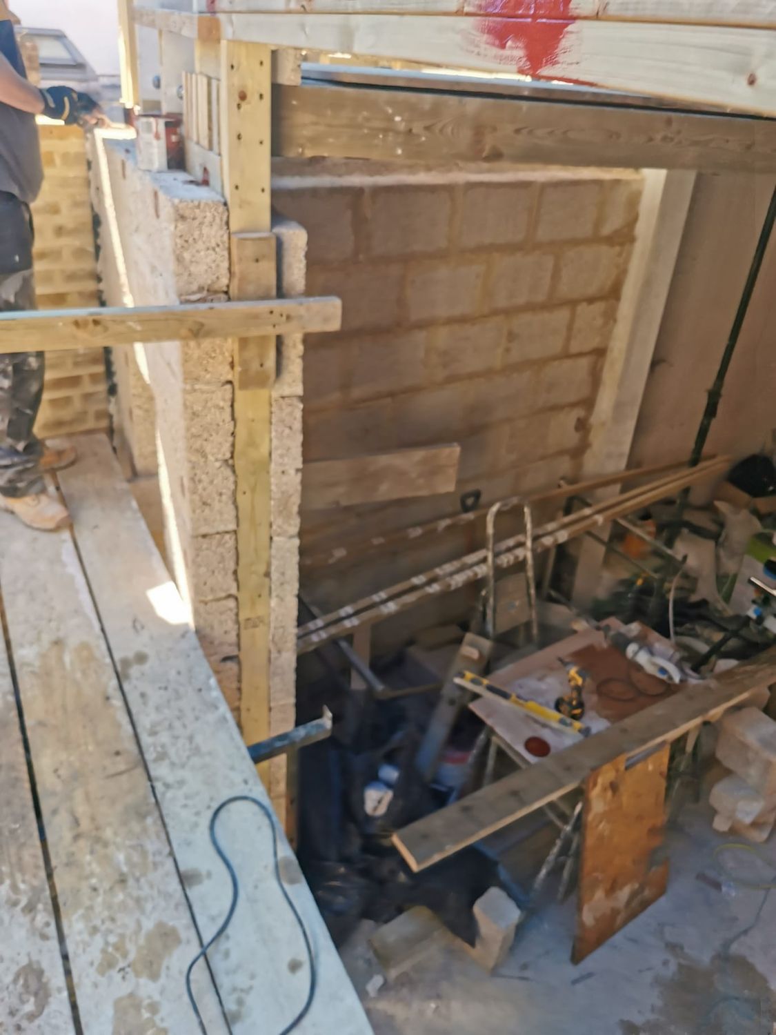 Hempcrete blocks built onto timber frame wall