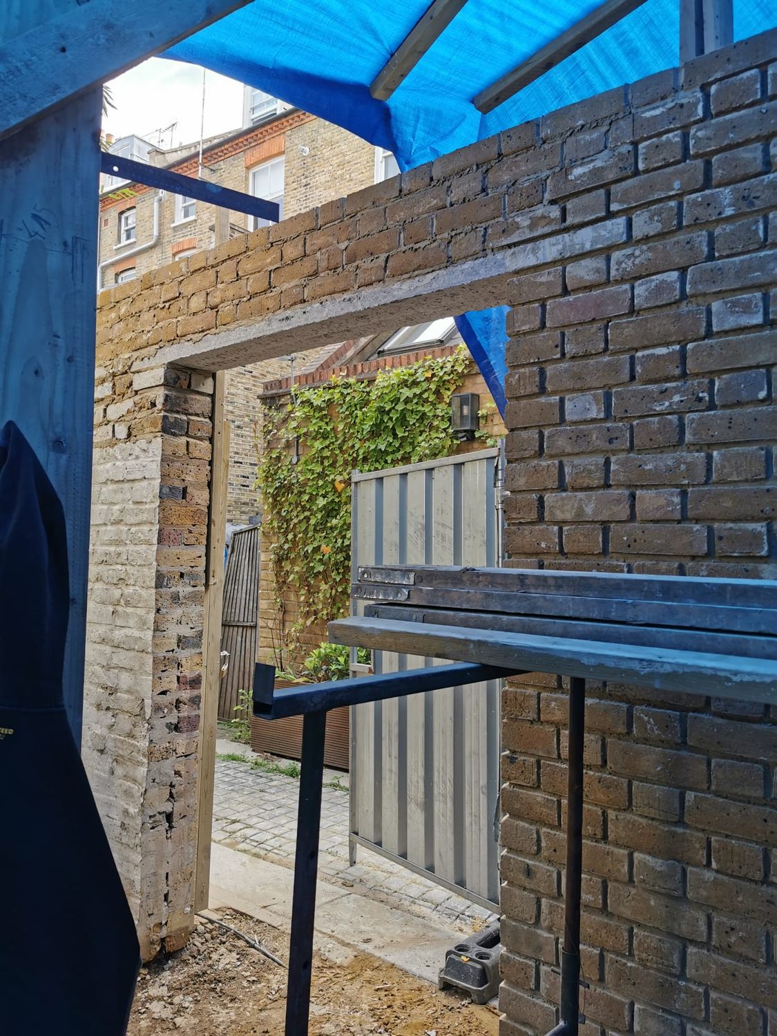 New gate opening to rear garden