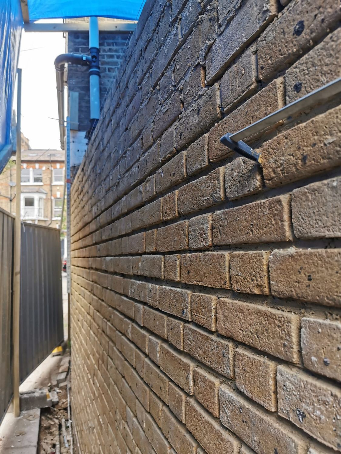 New brickwork going up to suit original brickwork