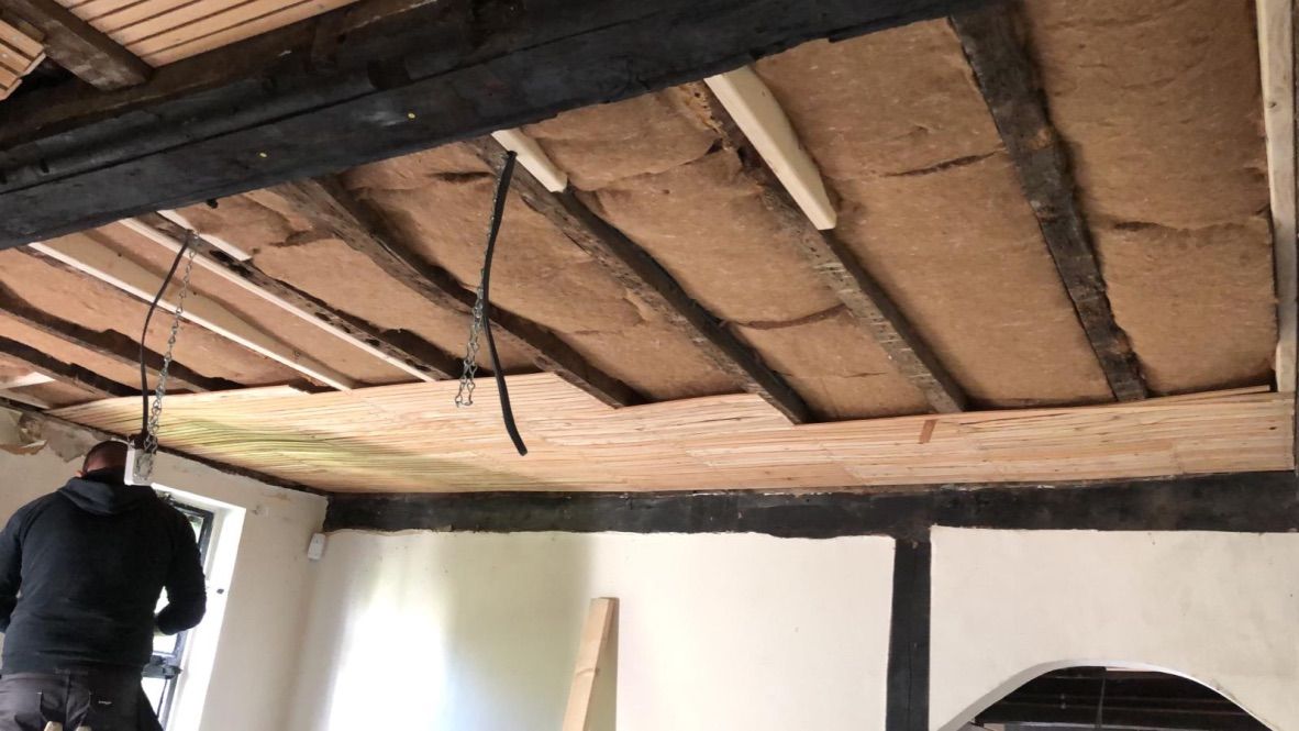 Nailing timber lath to ceiling rafters