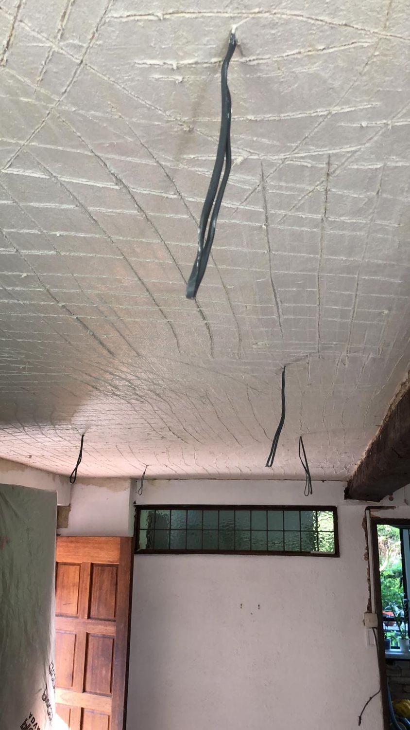 Lime scratch coat on lath
