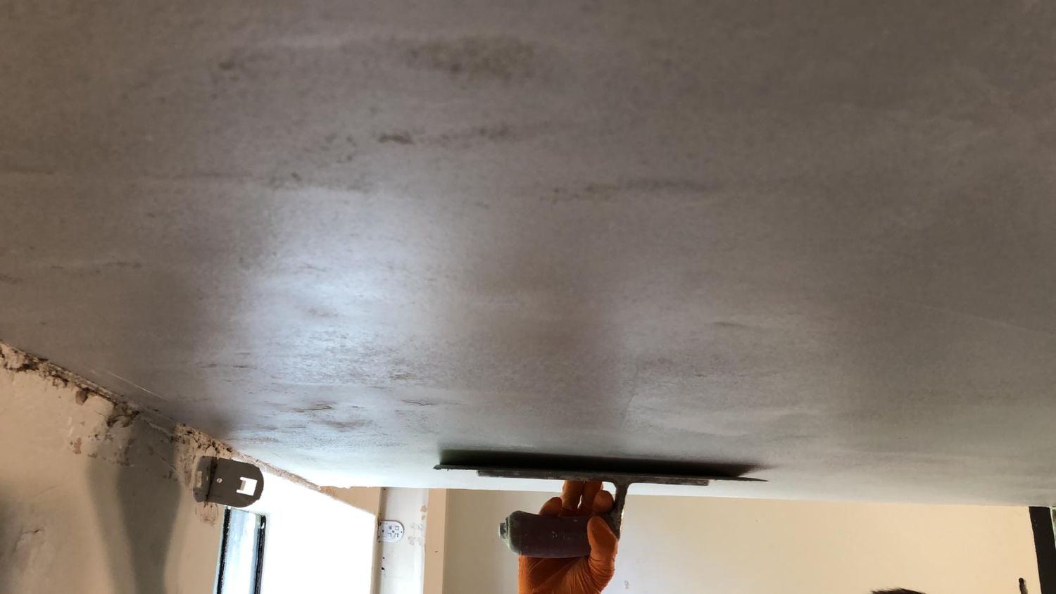 Lime plaster finishing coat on lath