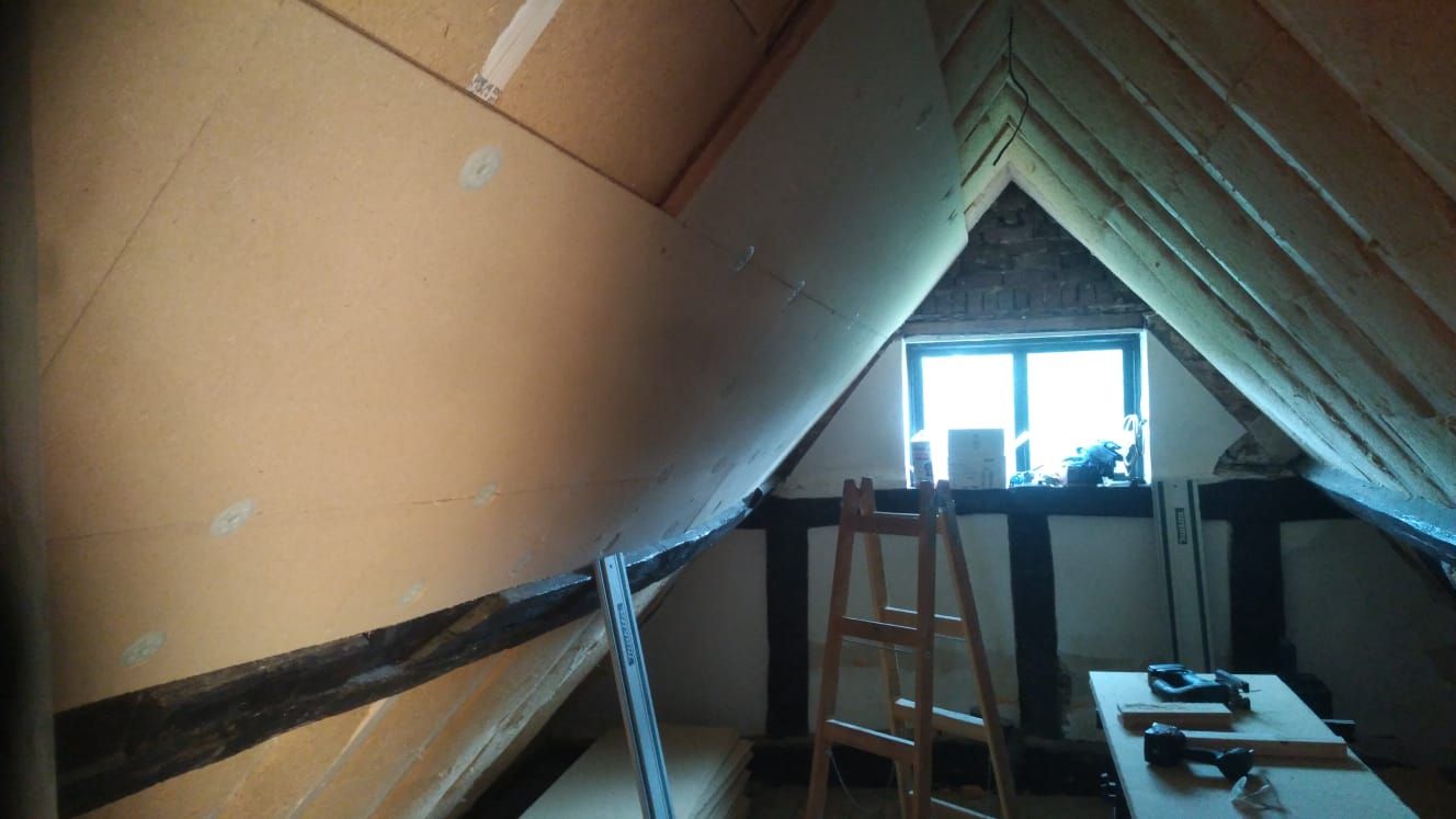 Pavatex boards and the exposed beams