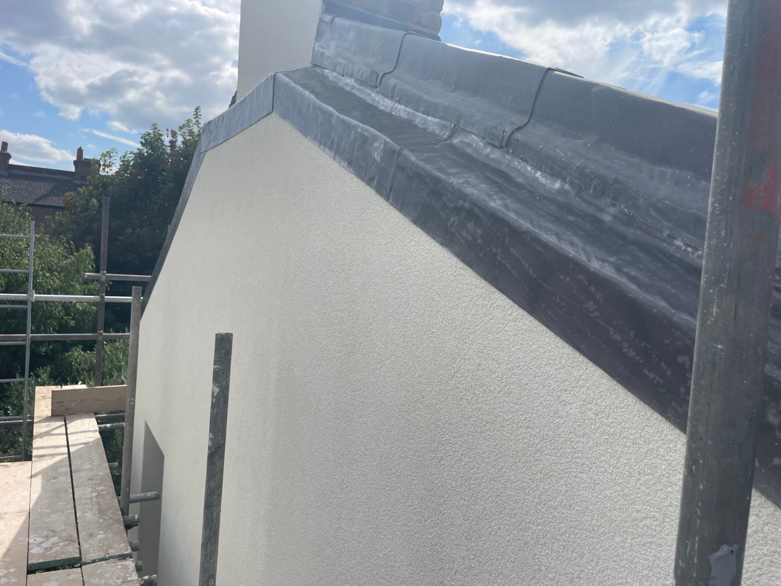 EWI with lead flashing at the top